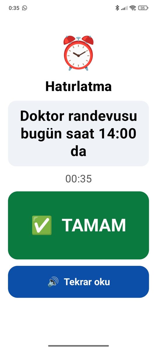 A reminder ringing: the note in large letters and an OK button